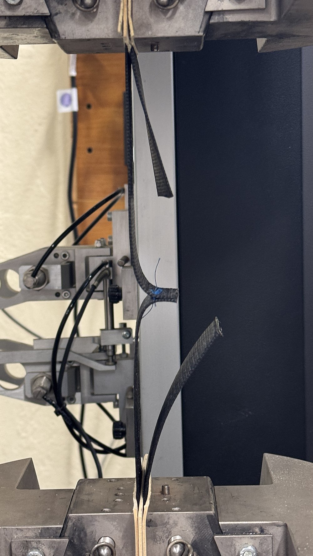 Belt specimen clamped and under load