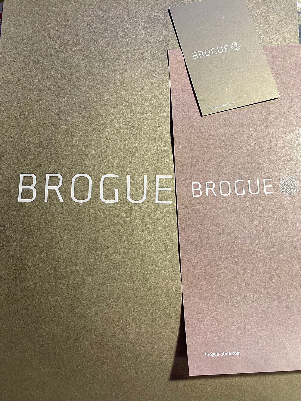 Brogue store packaging — box and tissue in the house colours