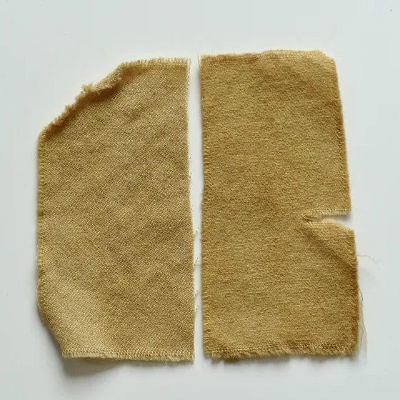 Wool dyed with pomegranate after an alum mordant &mdash; clear gold